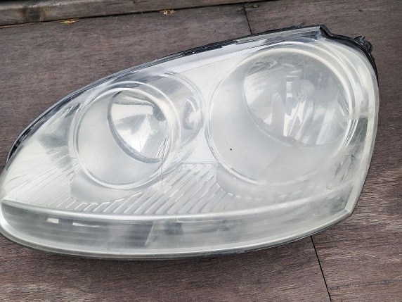 Фара левая (хром) Volkswagen Jetta 2005-2010 / Golf V 2003-2008 (Б/У) Дисконт